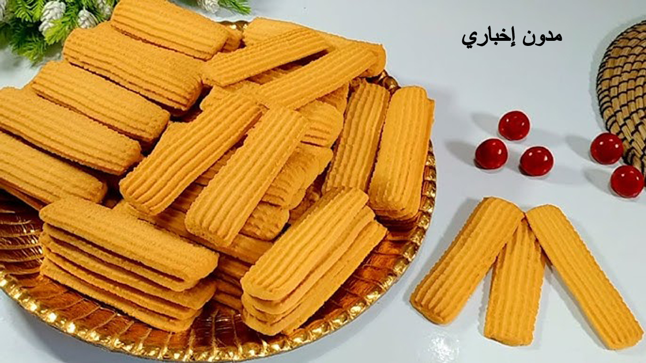 بمكونات بسيطة طريقة عمل بسكويت البرتقال هش وخفيف